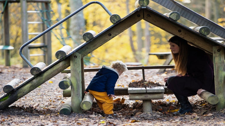 Family enjoying the adventure play area at Wallington